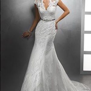 Beautiful lace Sottero and midgely wedding dress